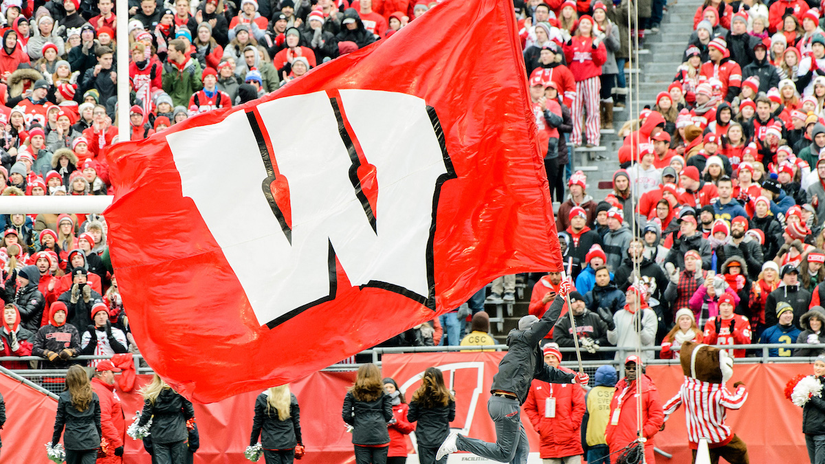 motion W flag at a football game